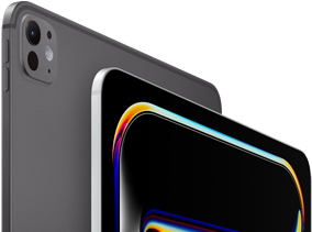 Un iPad Pro color nero siderale visto da dietro, tasti del volume e sistema di fotocamere Pro; un iPad Pro color argento visto di fronte, angoli arrotondati, cornice del display nera. Il display mostra uno sfondo nero con un motivo astratto a linee multicolori